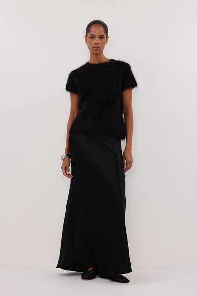 Kristen wearing SALMA BLACK CAP SLEEVE KNIT TOP