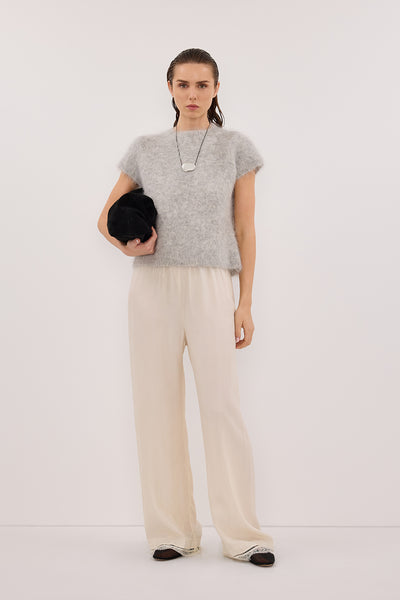 Stas wearing SALMA SILVER CAP SLEEVE KNIT TOP