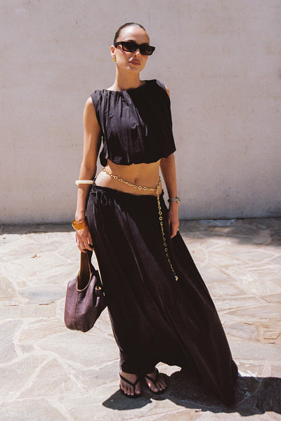 Casey wearing AVA BURNT CHOC SLEEVELESS MODAL BLEND TOP