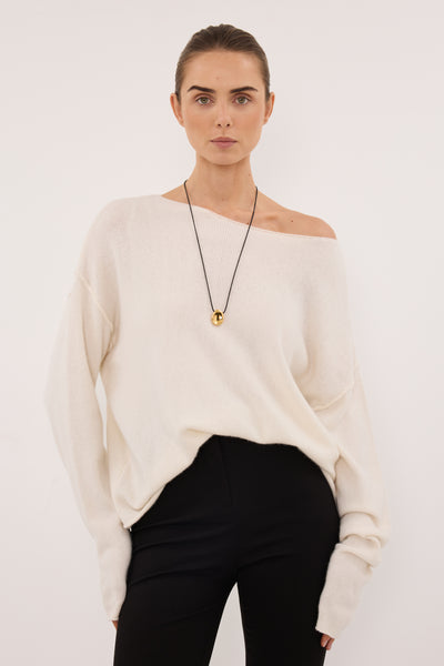 Jasmine wearing TESS IVORY BOATNECK KNIT JUMPER