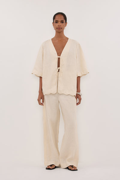 Kristen wearing LELA SANDSTONE SHORT SLEEVE LINEN SHIRT