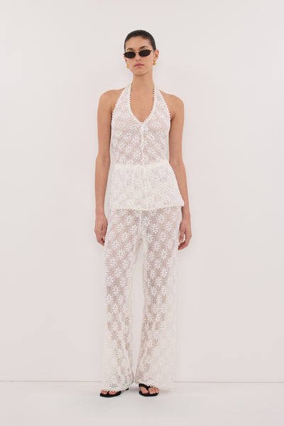 Aude wearing AGNES WHITE SLEEVELESS CROCHET HALTER TOP