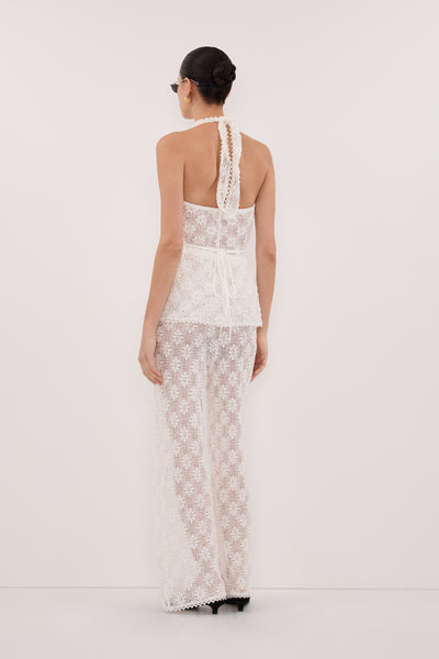 Aude wearing AGNES WHITE SLEEVELESS CROCHET HALTER TOP