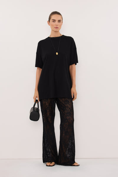 Stas wearing SLOANE BLACK COTTON LONGLINE TEE