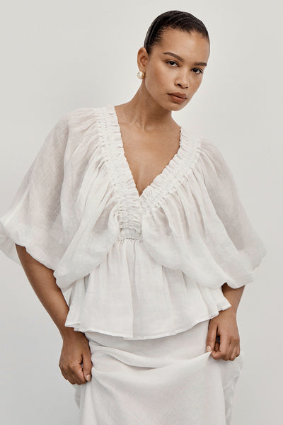 Stas wearing BRIELLE WHITE RAMIE LONG SLEEVE TOP