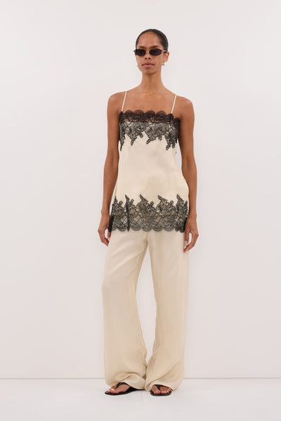 Kristen wearing MINA STRAW CUPRO LACE TOP