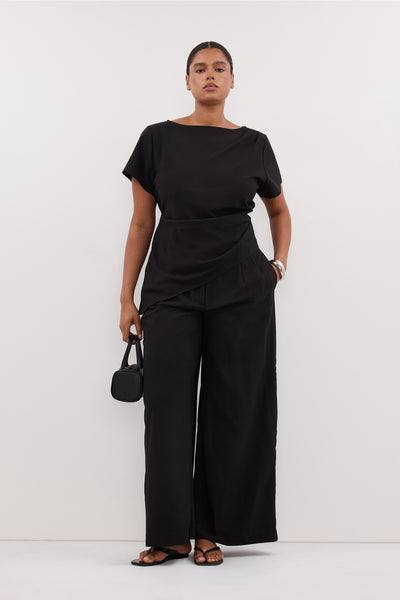 Amanda wearing PARKER BLACK ASYM TOP
