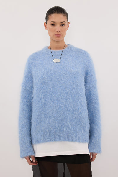 Aude wearing SALMA DUSTY BLUE CREW NECK KNIT JUMPER