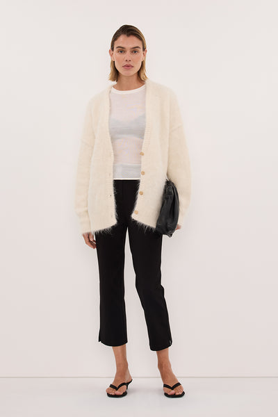 Joanna wearing SALMA IVORY LONGLINE CARDIGAN