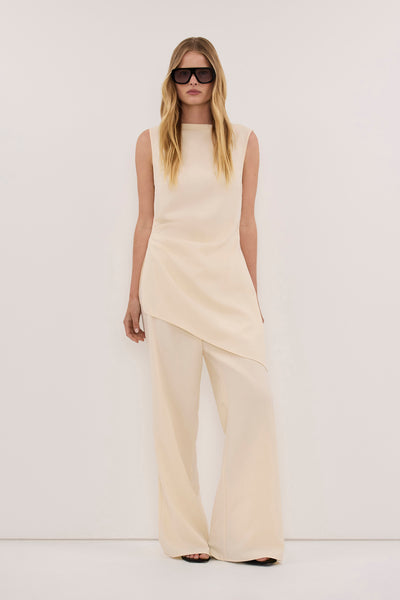Zoe wearing KENDALL BUTTER DRAPED LONG ASYM TOP