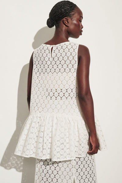Cynthia wearing RENATA WHITE LACE DROP WAIST TOP