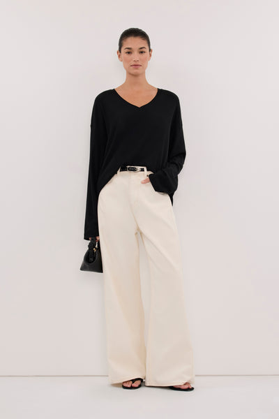 Aude wearing DARINA BLACK V NECK SLEEVED TOP