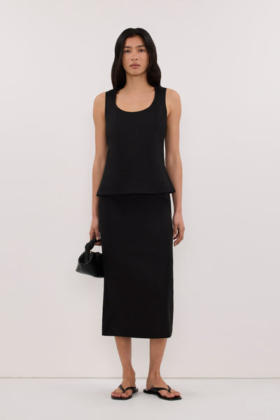 Zoey wearing AURELI BLACK LINEN TOP