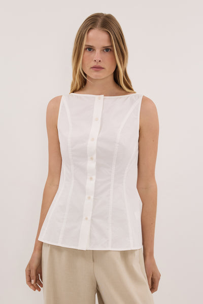 Zoe wearing SCOTTIE WHITE SLEEVELESS COTTON TOP