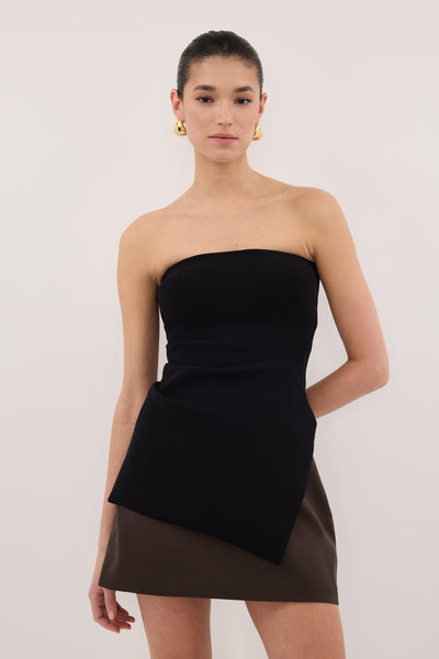 Casey wearing SOHO BITTER CHOC TAILORED SKORT