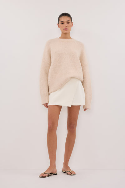 Aude wearing JULIE CREAM TAILORED SKORT