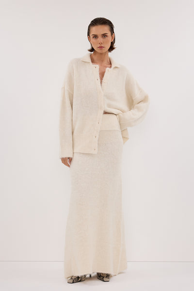 Stas wearing SALMA IVORY KNIT MAXI SKIRT