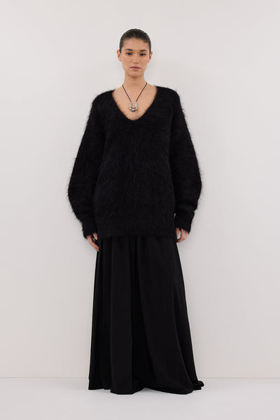 Aude wearing SIERRA BLACK TEXTURED MIDI SKIRT