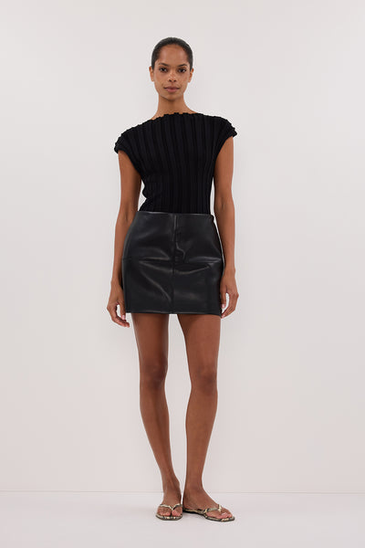 Kristen wearing MONTY BLACK FAUX LEATHER MINI SKIRT