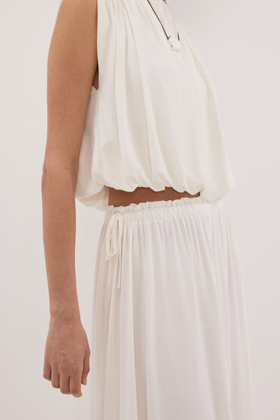 Jasmine wearing AVA OFF WHITE MODAL BLEND MIDI SKIRT