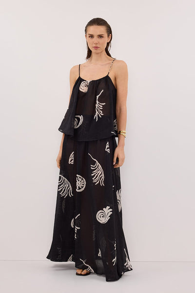 Stas wearing POSITANO BLACK RAMIE MIDI SKIRT