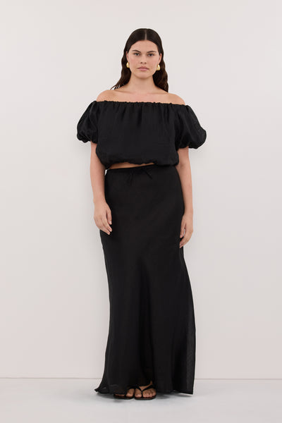 Jasmine wearing MAISON BLACK RAMIE BIAS MAXI SKIRT