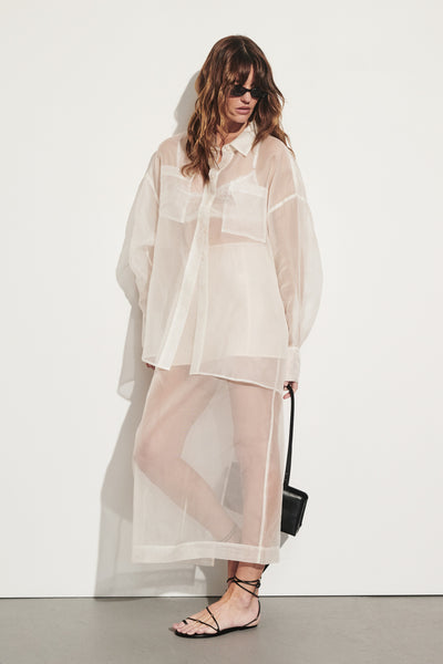Zoey wearing SIAN IVORY SILK ORGANZA MIDI SKIRT