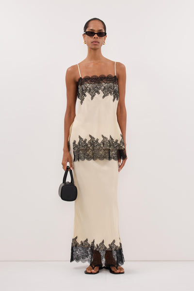 Kristen wearing MINA STRAW CUPRO LACE MIDI SKIRT