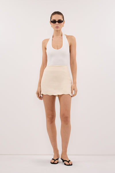 Stas wearing LELA SANDSTONE LINEN SKORT
