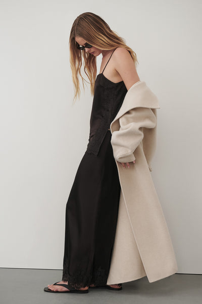 Zoe wearing SELENE ESPRESSO SATIN MIDI SKIRT