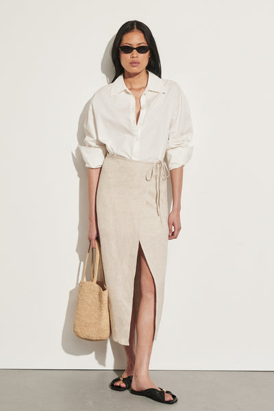Ploy wearing ODETTE NATURAL LINEN WRAP MIDI SKIRT