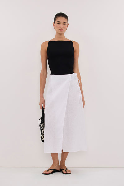 Aude wearing ODETTE WHITE LINEN WRAP MIDI SKIRT