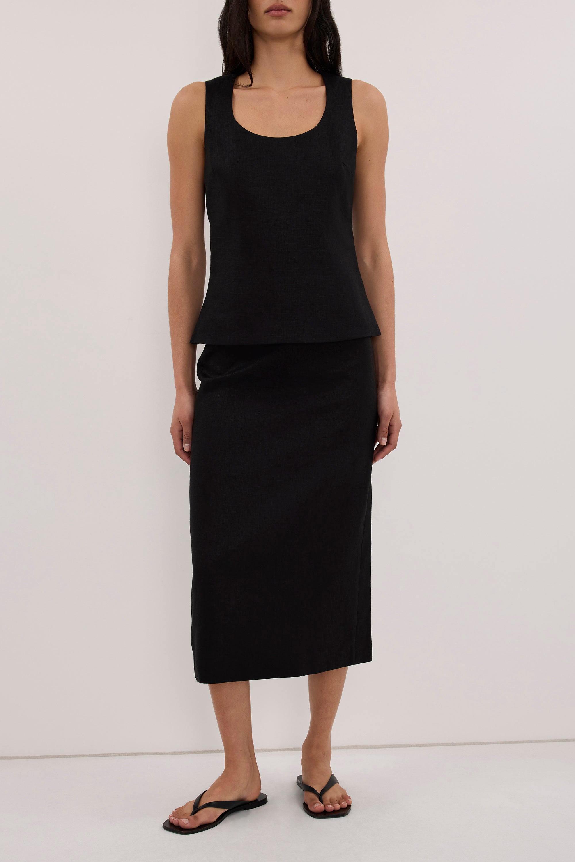 AURELI BLACK LINEN PENCIL MIDI SKIRT