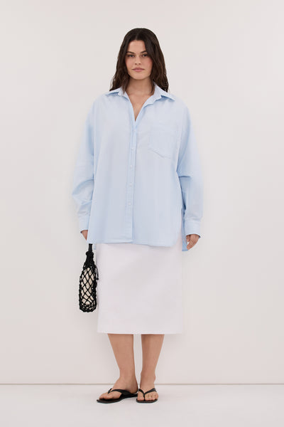 Jasmine wearing AURELI WHITE LINEN PENCIL MIDI SKIRT