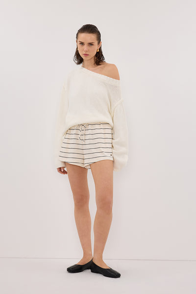 Stas wearing ESME OFF WHITE STRIPE SHORT