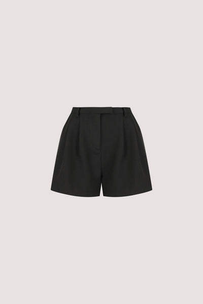 Stas wearing CYRUS BLACK TAILORED SHORT