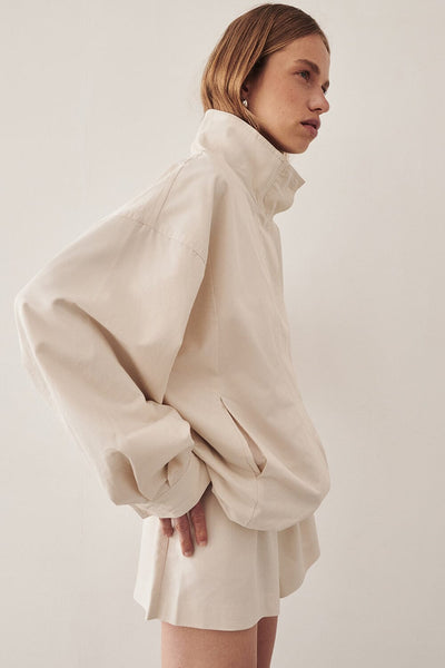 Zoe wearing RORY IVORY LIGHTWEIGHT TRACK SHORT
