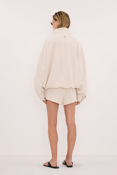 Amanda wearing RORY IVORY LIGHTWEIGHT TRACK SHORT