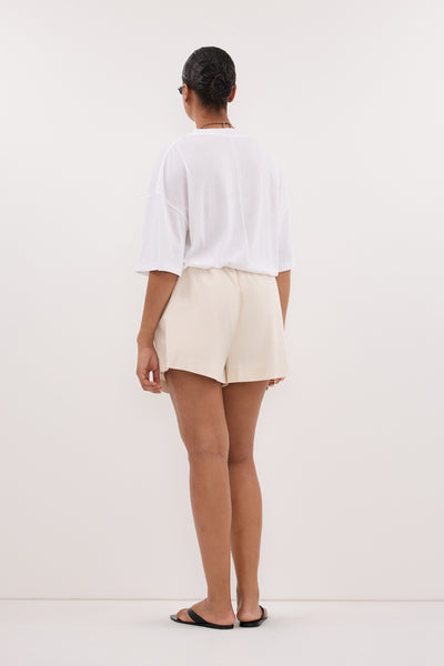 Kristen wearing RORY IVORY LIGHTWEIGHT TRACK SHORT