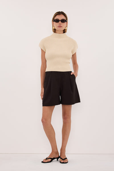 Joanna wearing MONIQUE PEAT CHOC TAILORED SHORT