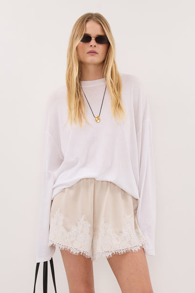 Zoe wearing SELENE OYSTER SATIN SHORT