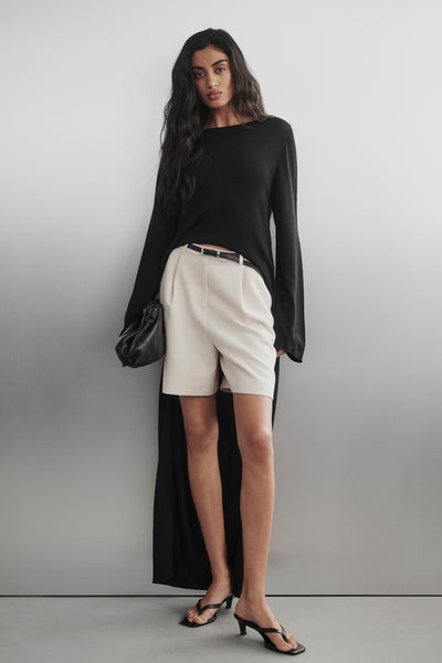 Anaya wearing SOLENE CREAM BERMUDA SHORT