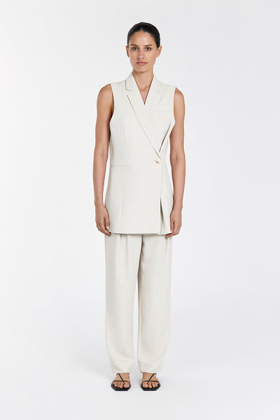 Adrienne wearing HUGO OAT TUCK PANT