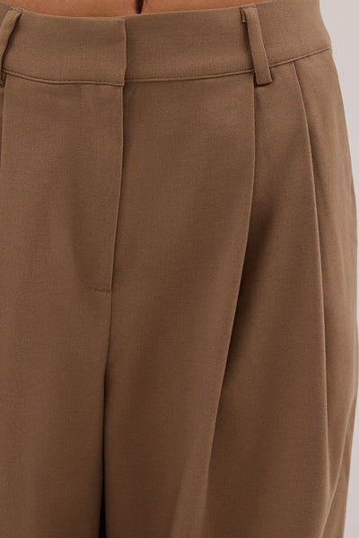 Kristen wearing CELINA TAN PANT