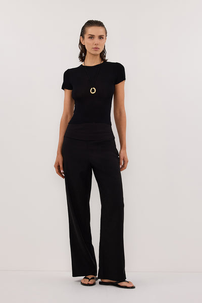 Stas wearing RITA BLACK TAILORED PANT