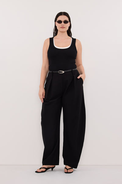 Jasmine wearing ROMY BLACK BARREL LEG TAILORED PANT