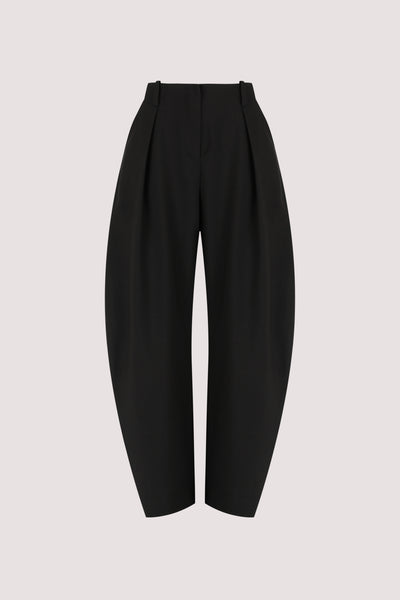 Stas wearing ROMY BLACK BARREL LEG TAILORED PANT