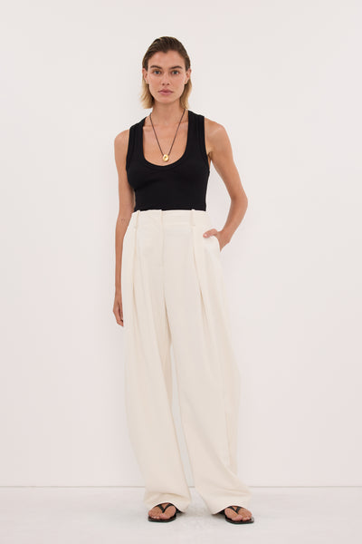 Joanna wearing ROMY CREAM BARREL LEG TAILORED PANT