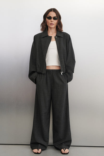 Joanna wearing MARCO GREY PLAID ELASTIC PANT