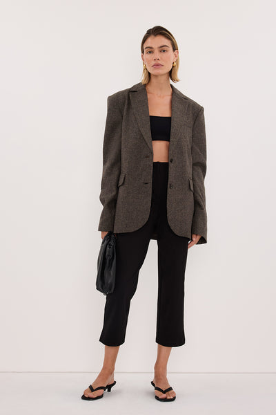 Joanna wearing DEMI BLACK 7/8 CAPRI PANT